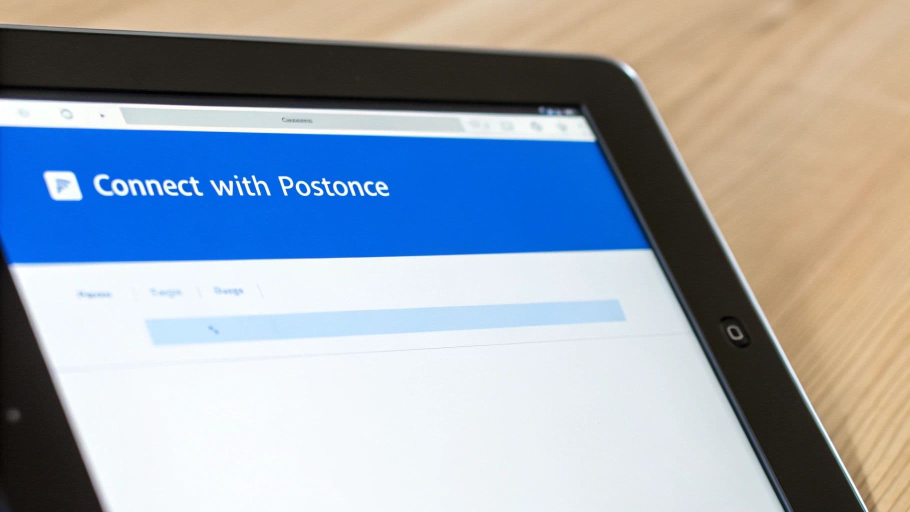 A close-up of a tablet screen displaying the text "Connect with Postonce" on a blue banner.