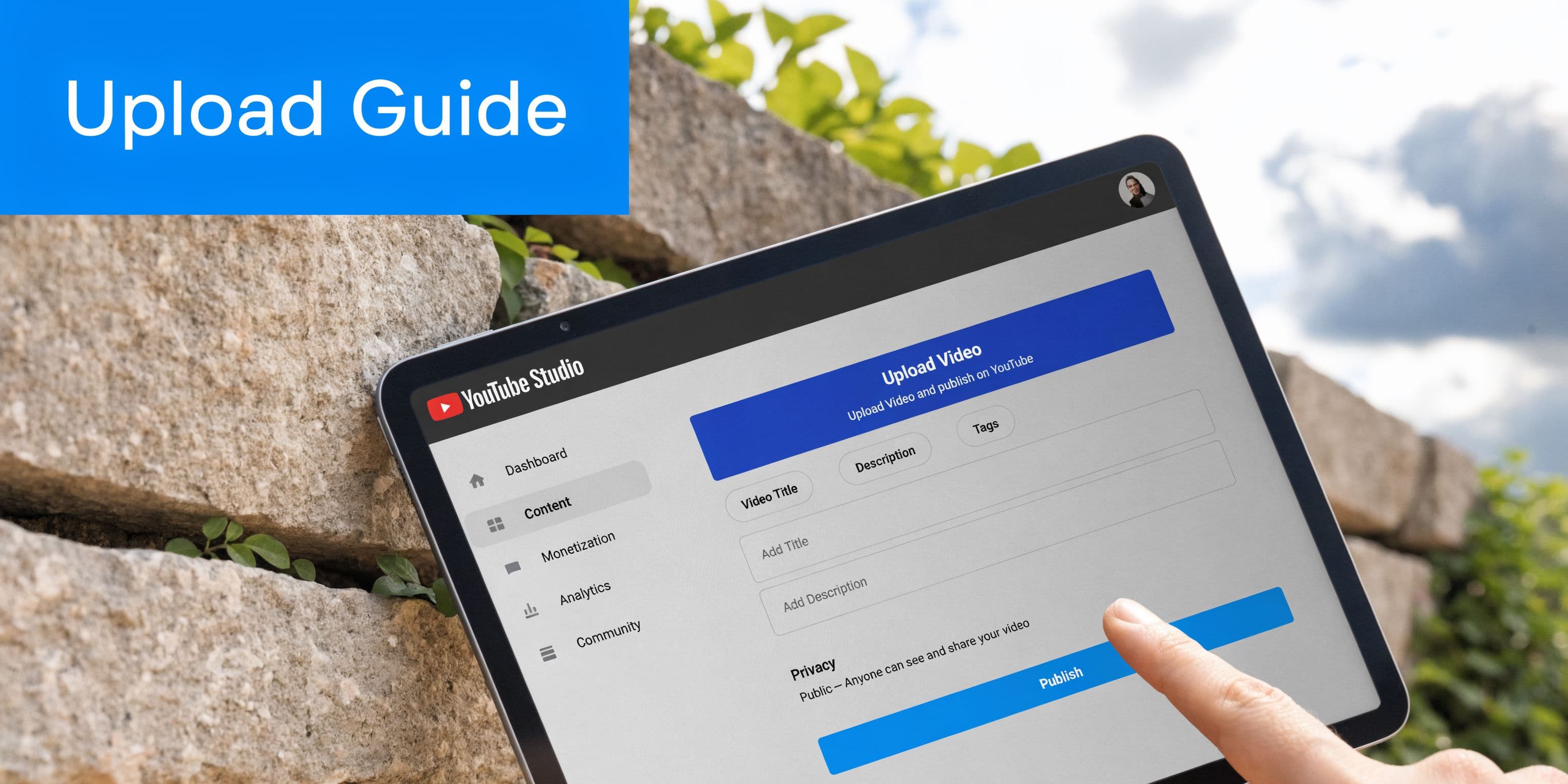 A hand touching a tablet screen displaying the YouTube Studio upload video interface for creators.