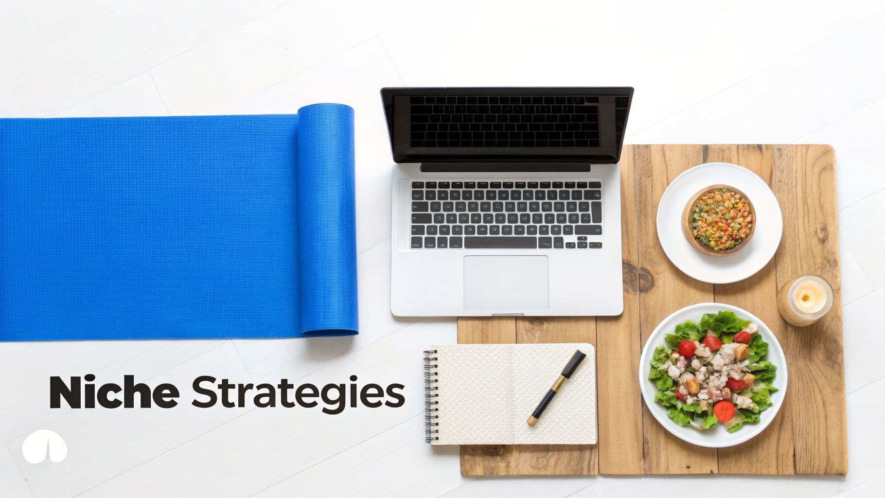 A flat lay shows a blue yoga mat, laptop, notepad, pen, and healthy meals with a candle on a white floor.